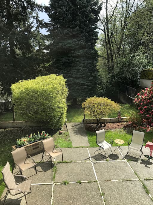 Fenced back yard with fire pit