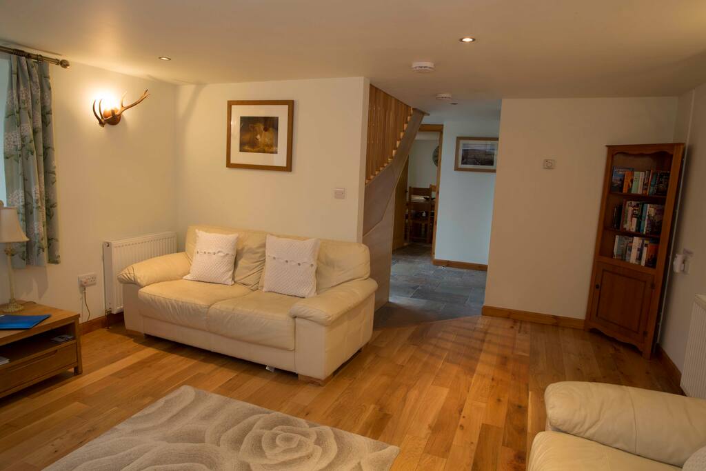 Cream leather settees