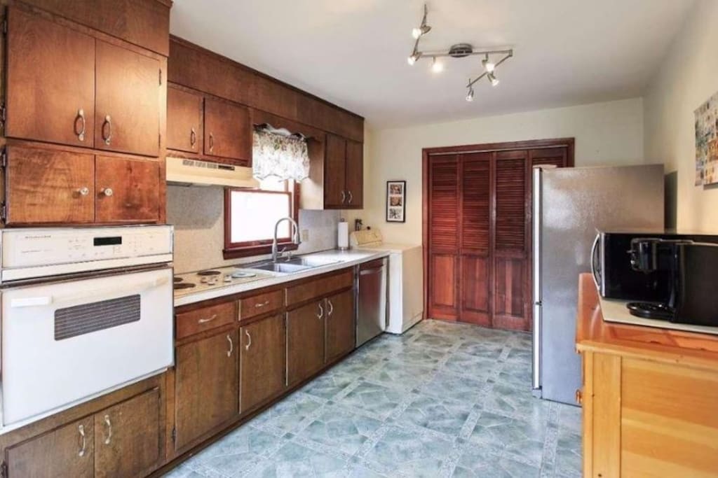Large kitchen with on premise laundry