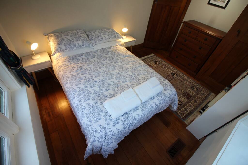 Bedside lamps just right for reading in bed after a long day of sightseeing.