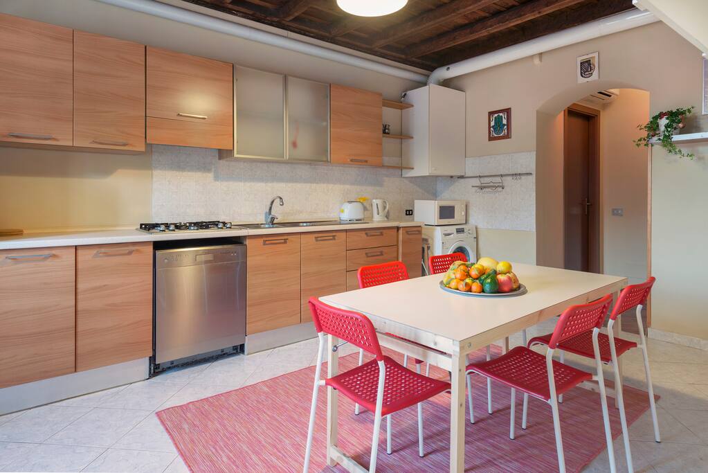 The new & equipped kitchen with dining table