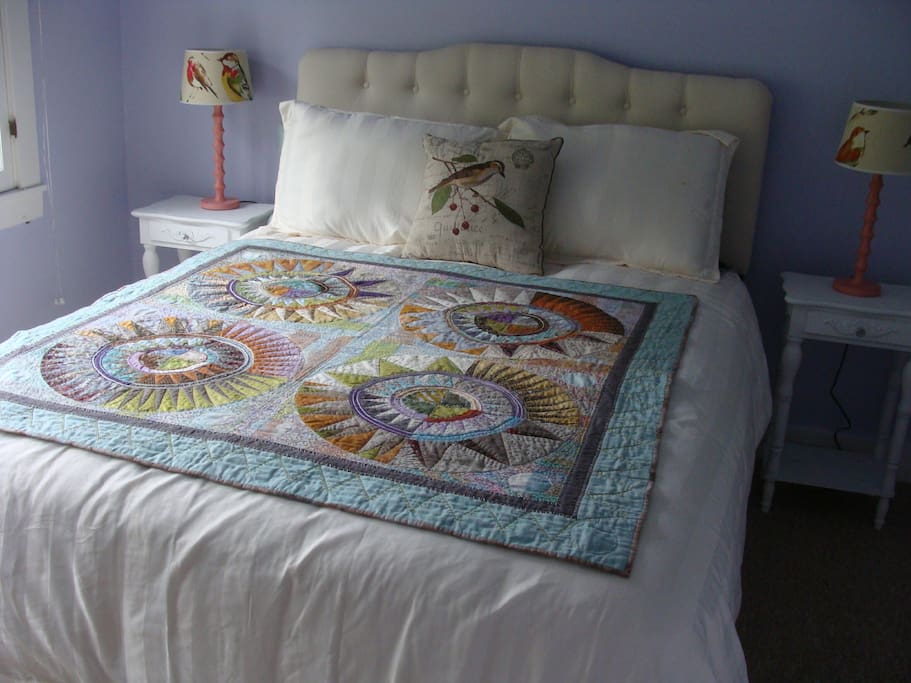 Queen bed in private bedroom.
