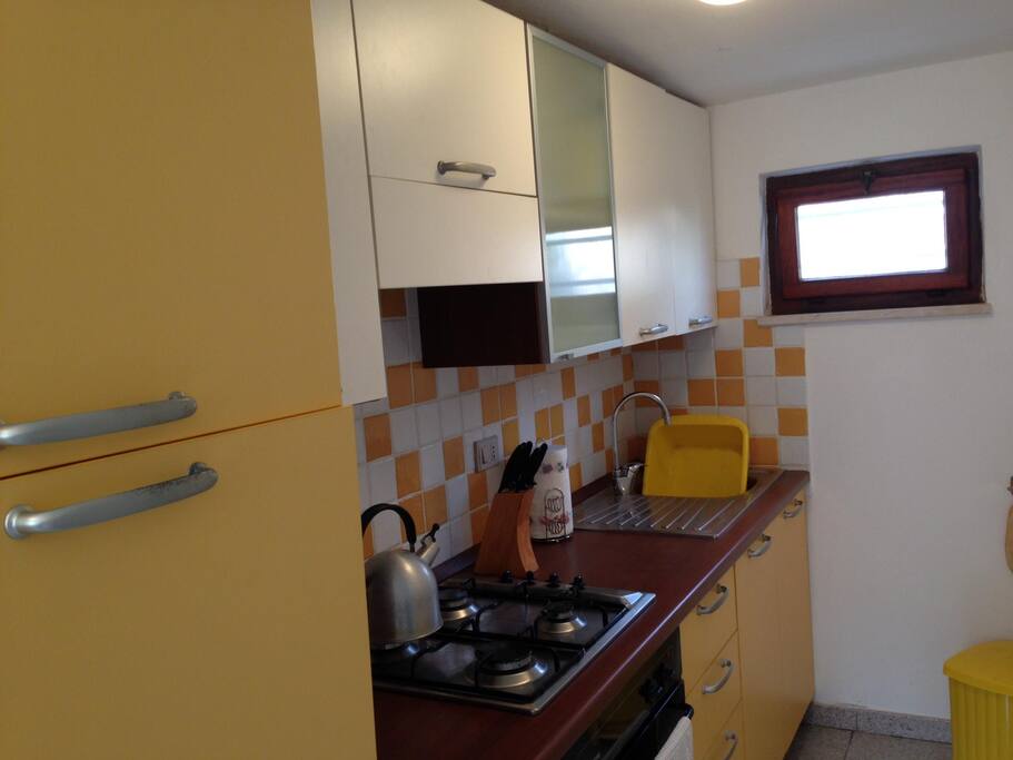 Well equipped, galley style kitchen area