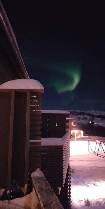 Northern lights seen from the balcony. The picture is taken 31. Dec. 2017