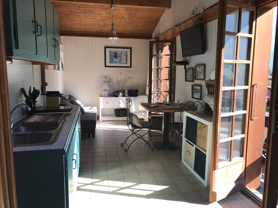 Open plan kitchen dining & living area. Table seats 4. Fridge, mini oven/grill, 2 gas hobs & sink