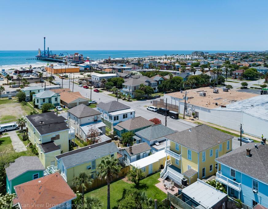 Drone view of the back of The Statesman home to the pleasure pier.