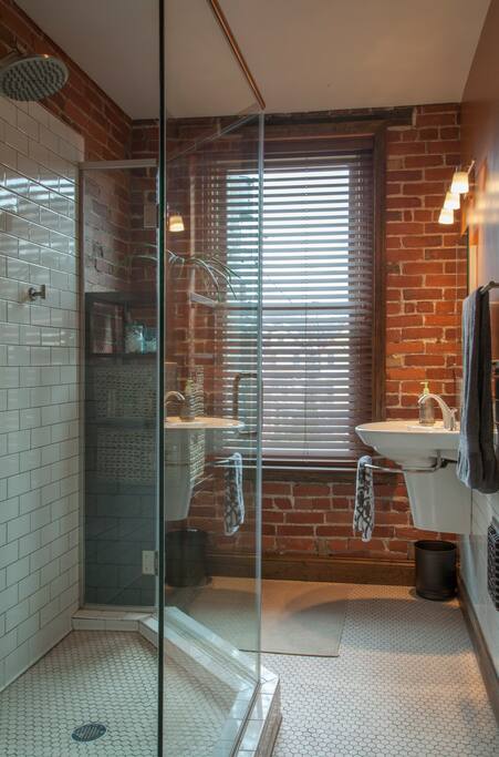 Shared modern bathroom on the second floor, adjacent to guest bedroom