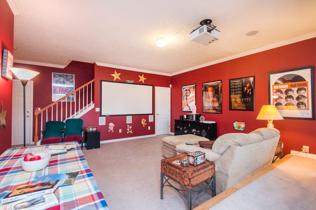 Kick back and choose from 120+ movies to watch on the huge movie theater screen with surround sound!