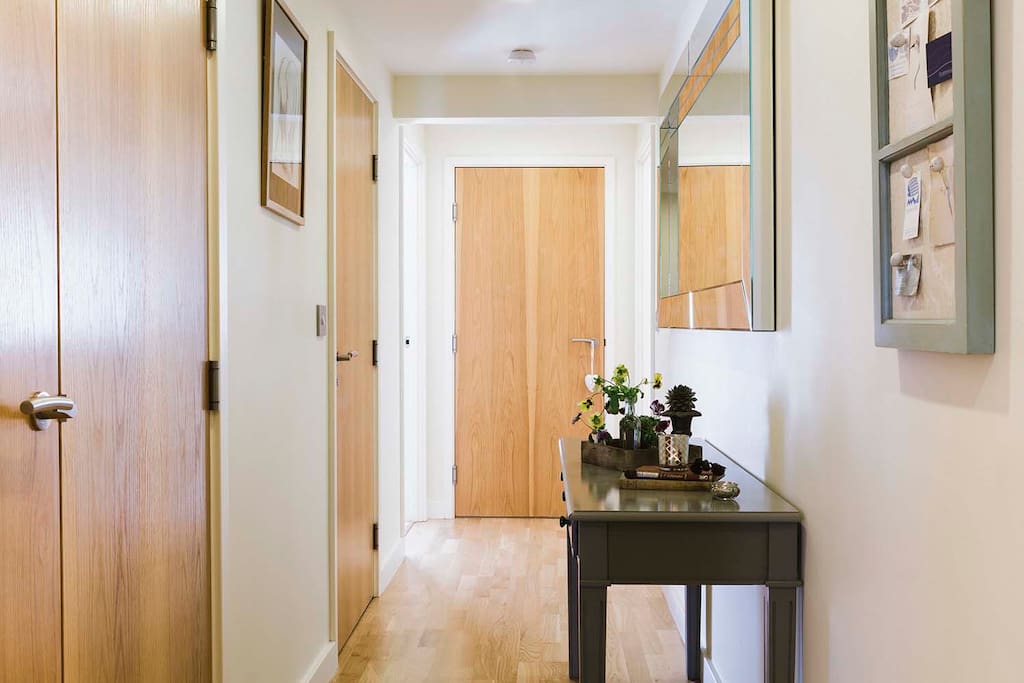 Light and airy hallway leading to all properties