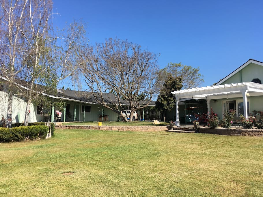 Cottage and our house connected by a covered walkway