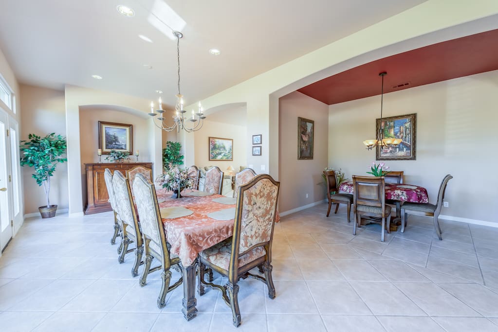Cozy breakfast nook and elegant dining room for eight offer multiple options at mealtime.