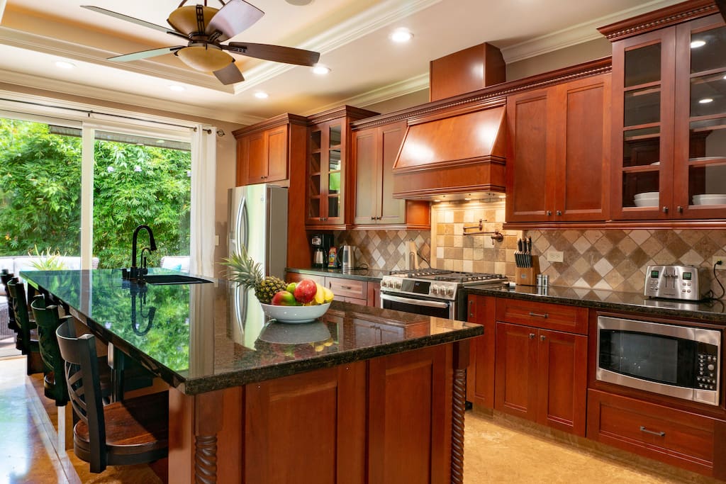 executive kitchen with gas stove.