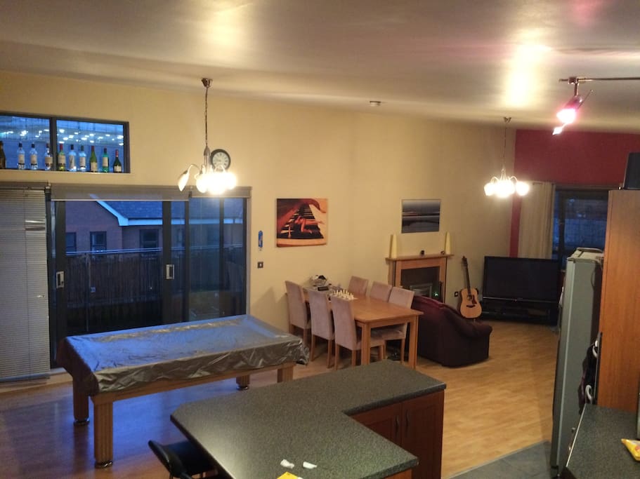 A pulled back viewpoint of the living area.