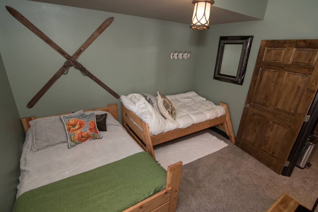 Evergreen Room - One single bed and one double bed, satellite TV, free Wi-Fi, and his and hers luxury bath amenities.
