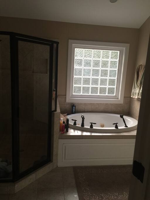 Master bathroom
With jet tub and stand
Up tile shower.