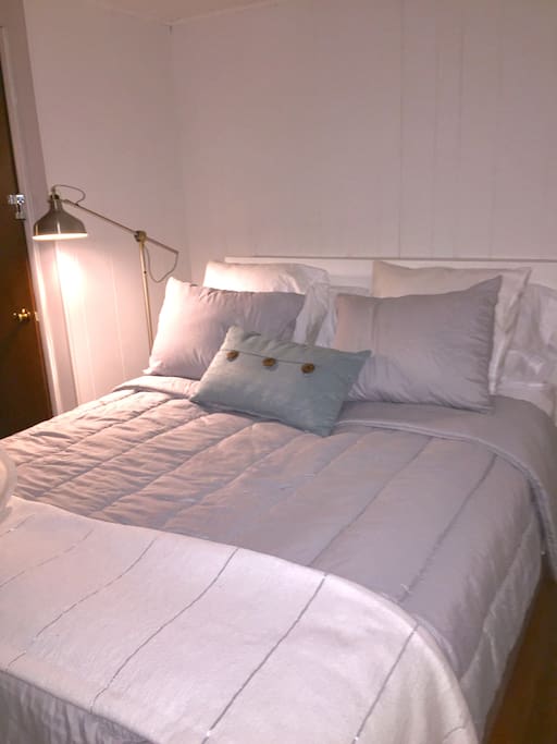 Queen bed downstairs, no pictured half bath also space for air mattress here as well