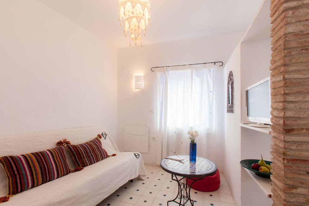 Salón con sofá cama doble
