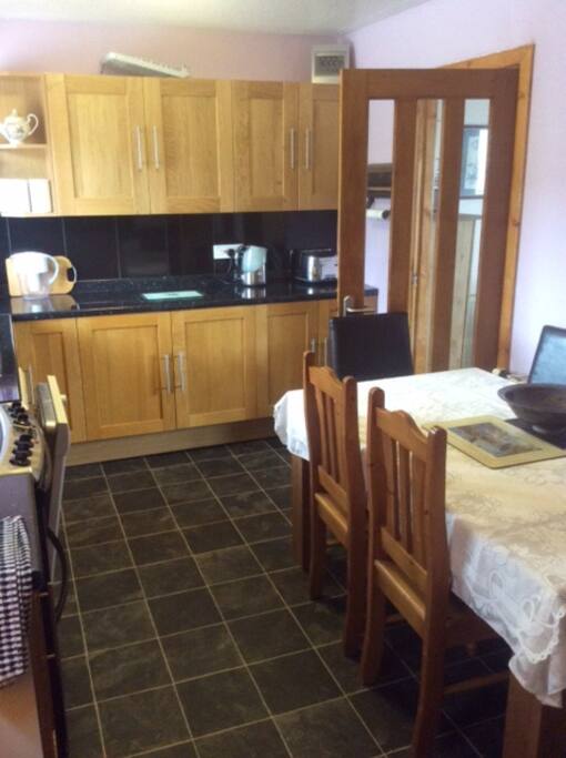 Fully fitted kitchen with all you need and space for 6 to dine.