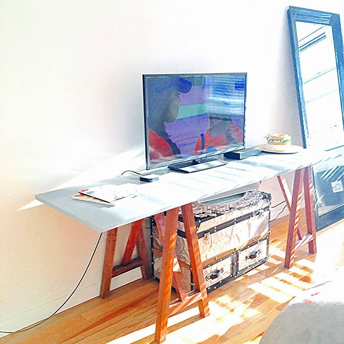Watch Cable TV in the master bedroom and use the floor length mirror before heading out in the city.