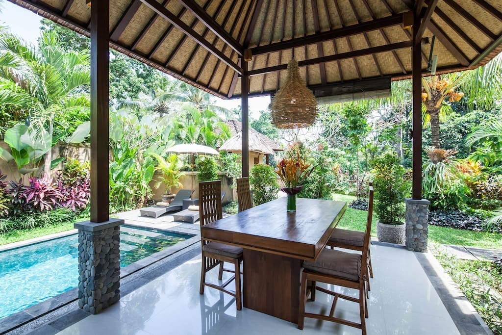 Balinese style and tropical lush garden with open air dinning area.
