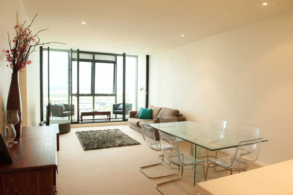 Open plan living and dining area, netflix TV, air conditioning and amazing views from the 40th floor