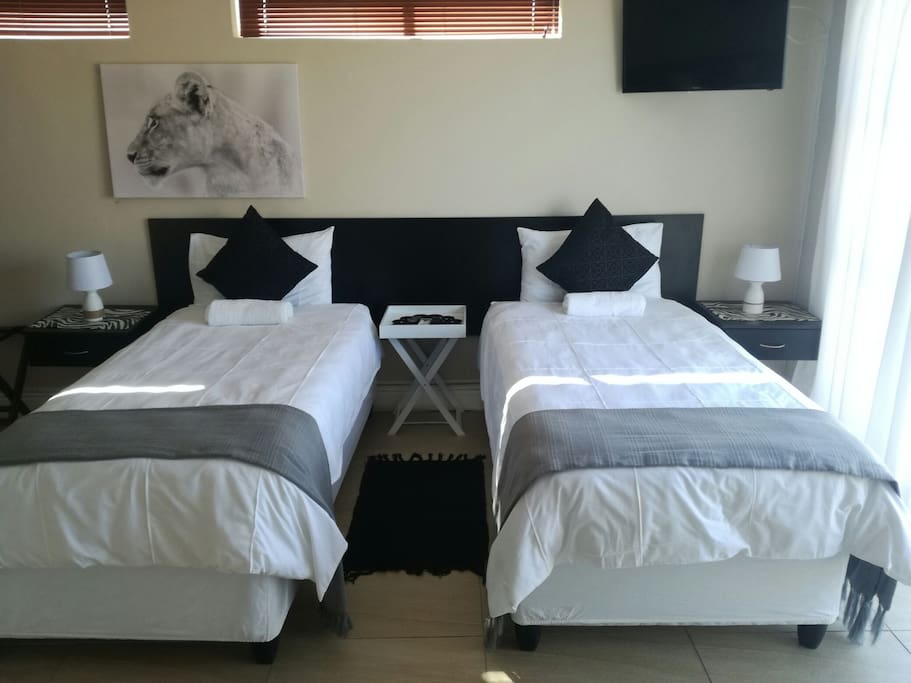 Still room 1, our family room. Has outdoor furniture, Balcony with Ocean View. (Occupancy 4)