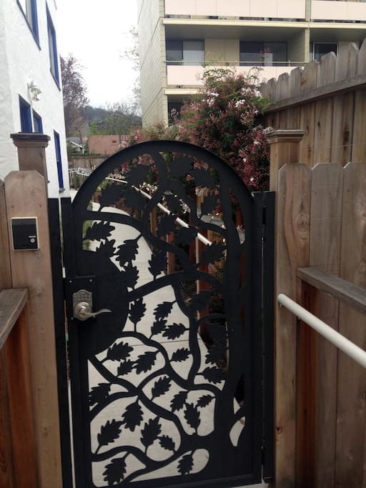 Beautiful gate and walkway to private entrance.