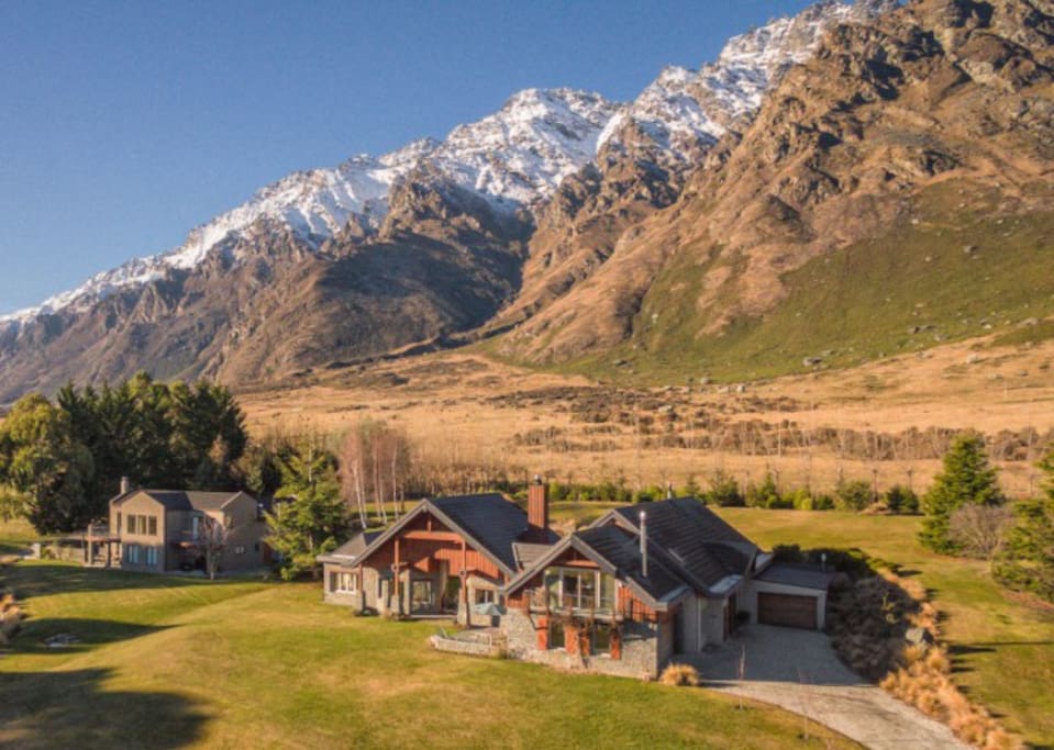 Aerial view of Valhalla Lodge with the spectacular Remarkables Mountains in the background