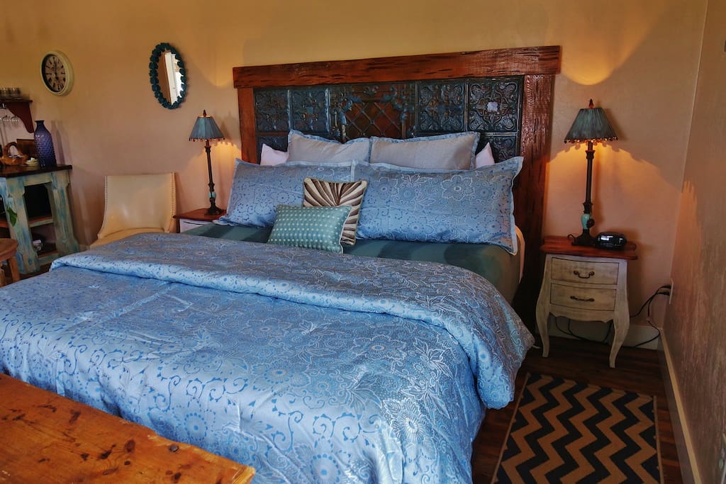 California King Bed with luxurious linens
