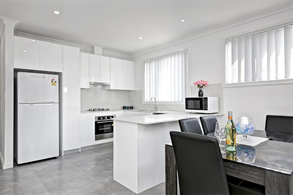 Lovely and modern, fully equipped kitchen with dining area