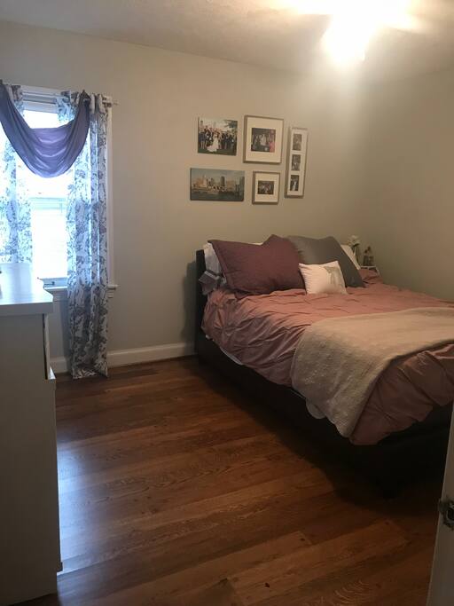 Second guest bed room has a queen bed and is adjacent to guest bathroom.