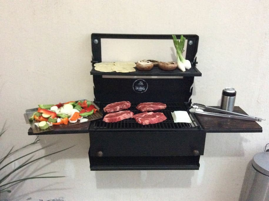 Asador abatible