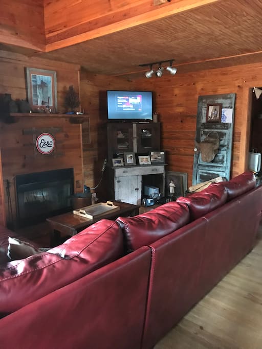 Den with large couch and living area