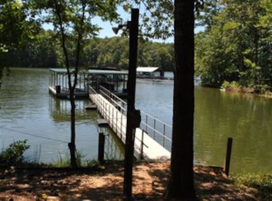 Dock for boating, kayaking, swimming, and fishing on a quiet cove.