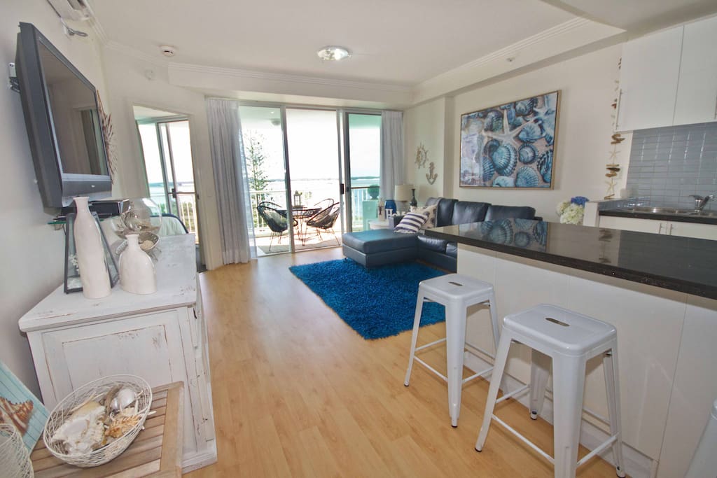 Living area including cable television.