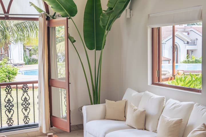 The living room overlooks the pool