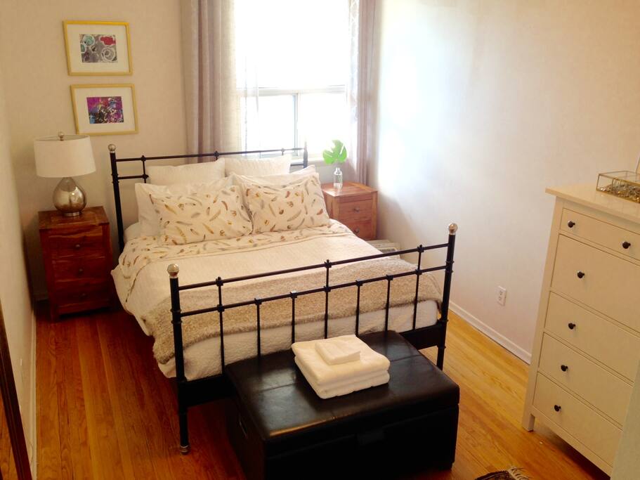 Master bedroom with queen bed on the second floor.