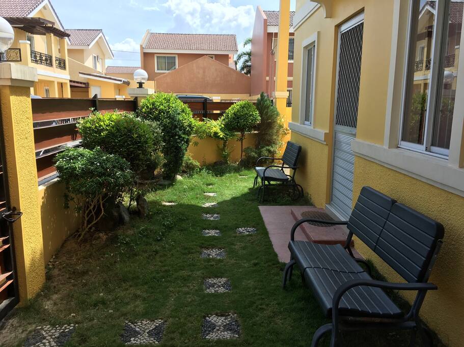 A touch of green landscape, relaxing point with seesaw chairs.