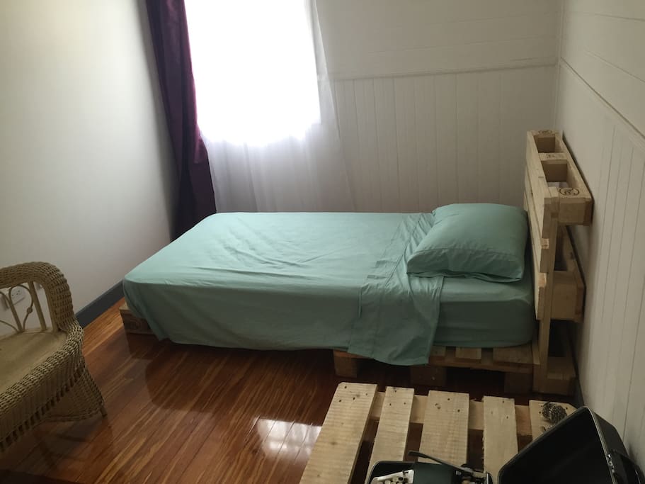 Your room. The bed is made out of palets, the mattress is orthopedic, anti-allergic and anti-bugs.