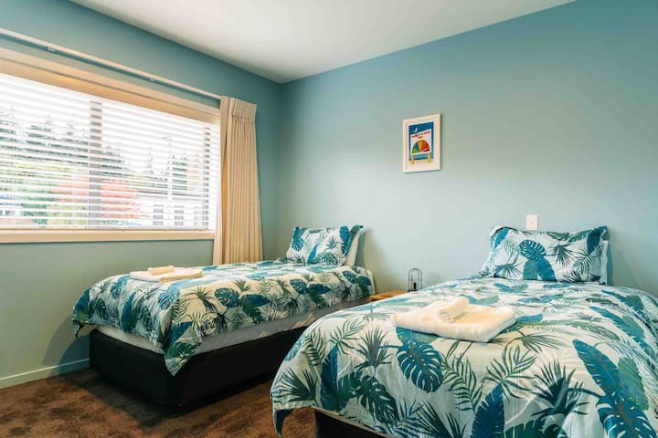 2 x King Singles, can be placed together to make a Superking bed.  But this is really the kids' bedroom!
