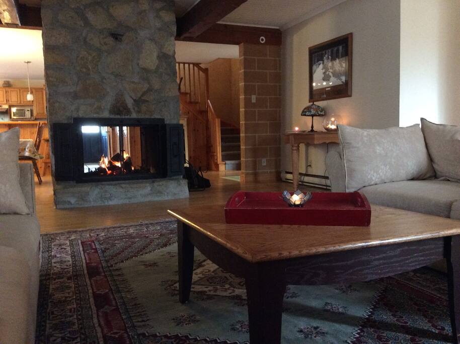 Open two sided fireplace from Living room to Dinning room