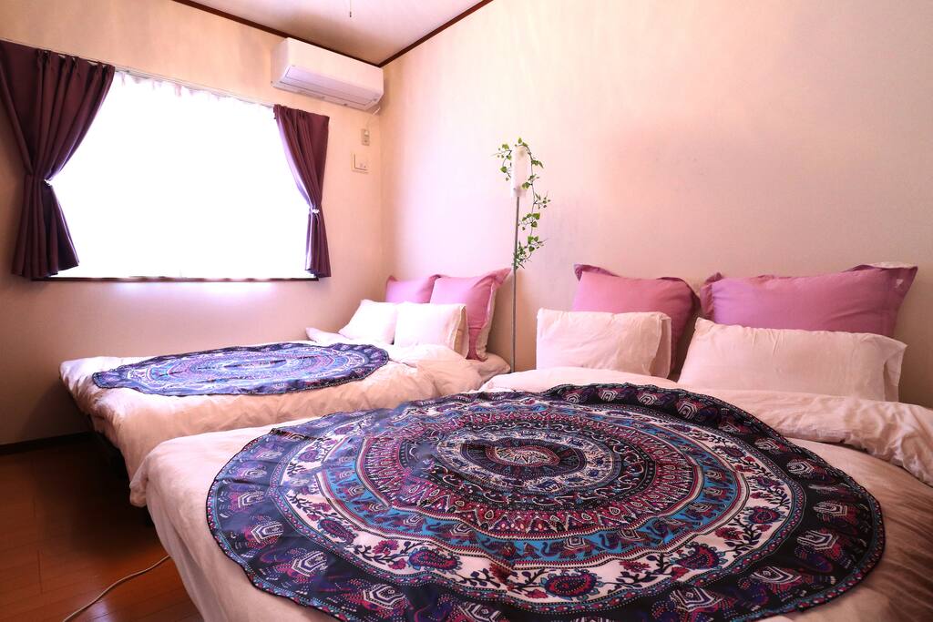Lovely bed room with a big bright window