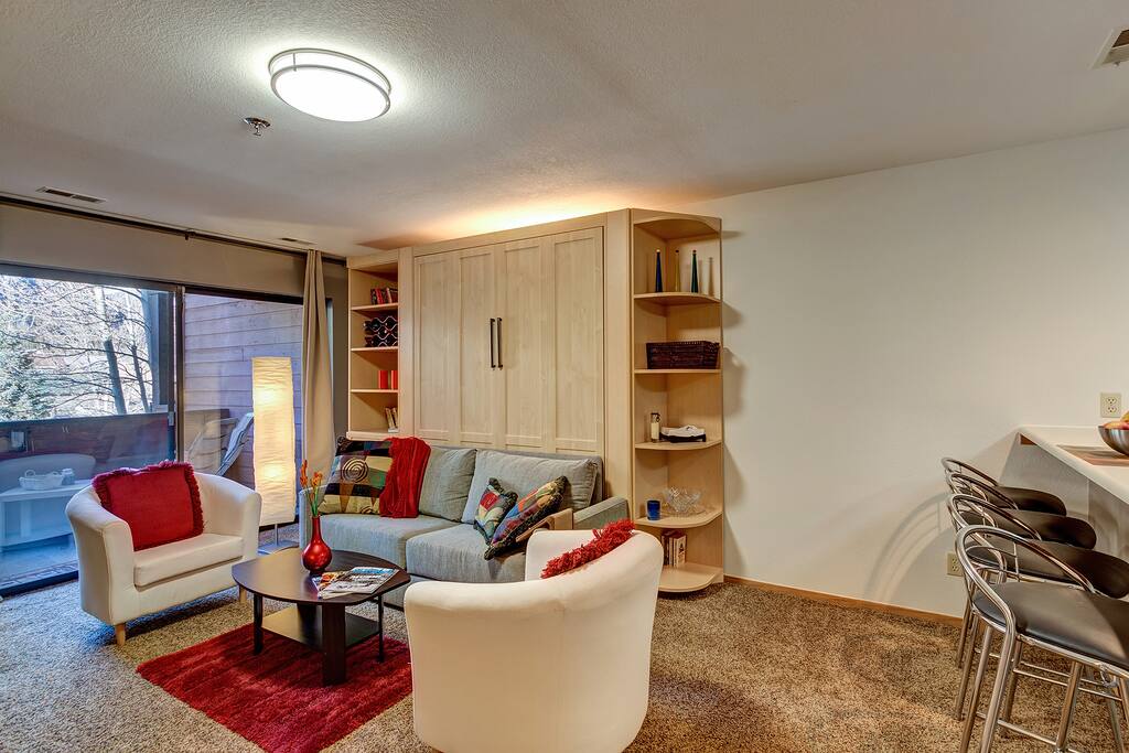 Just move coffee table, remove pillows from couch and have a real bed to sleep in