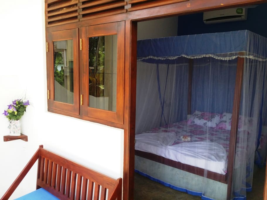 Comfortable double bedroom with A/C and Fan.