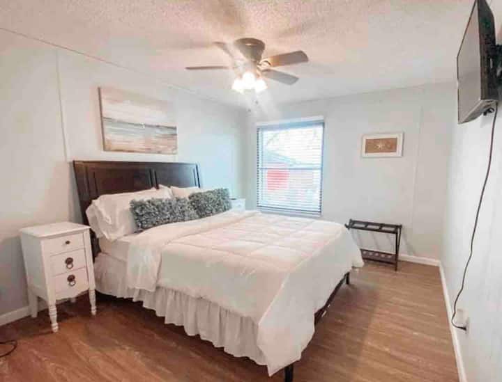 Guest Bedroom with a queen size bed. 