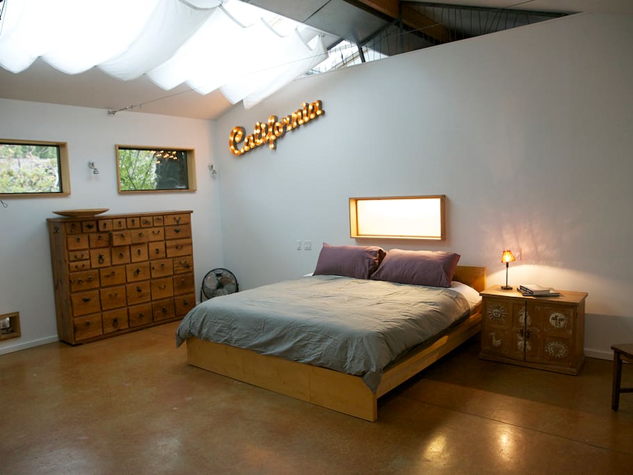 The loft king size bed and the great reading light window.