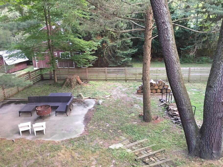 Fenced in back yard, lower patio with fire pit