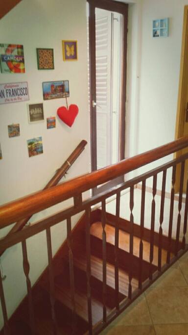 entrance in the house. glass door on the left lead tona small balcony. front door are from toilet