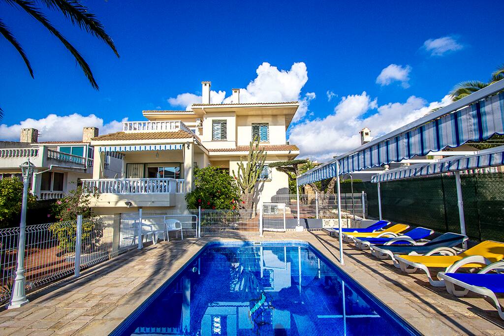 Villa exterior, patio, and private pool
