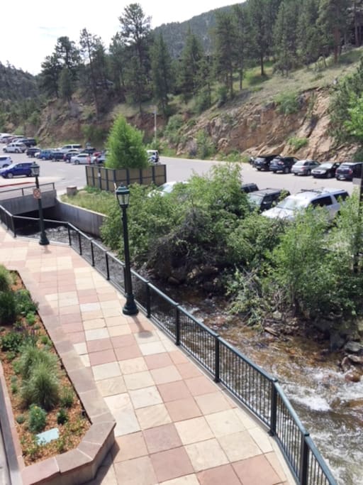 Enjoy the view of the riverwalk and there is public parking available right behind the loft.